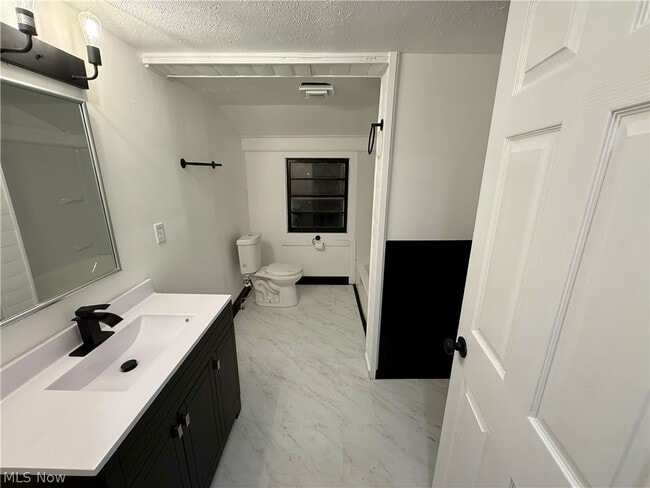 Building Photo - 5636 Hopkins Rd