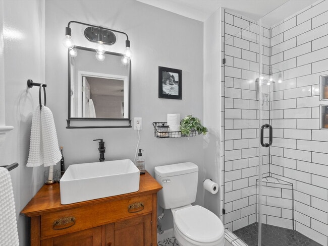 Building Photo - Beautifully Updated Home with Finished Lower Level, Fenced Yard & Exceptional Outdoor Living