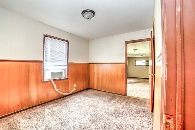 Building Photo - 4824 N Xanthus Ave