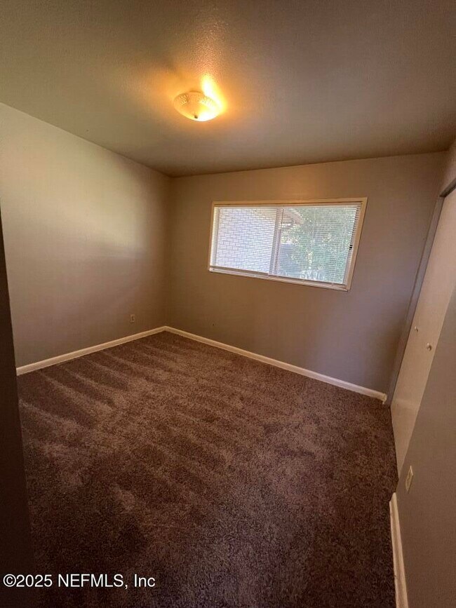 Building Photo - 8095 Lourdes Dr W