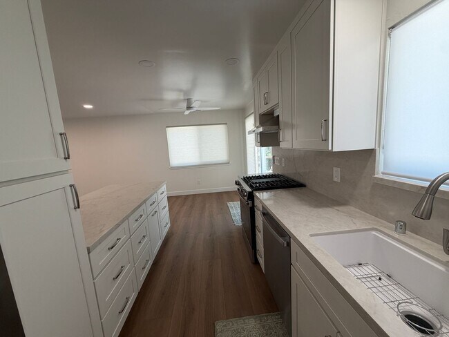 Building Photo - Charming Single Family Home - Completely Remodeled 2 Bed, 1.5 Bath with Garage
