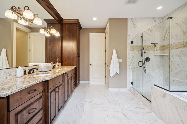 Building Photo - 2 Creeks Condominiums - Gated Community on...