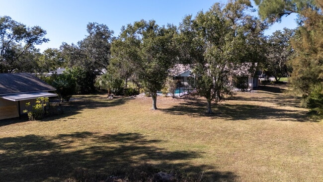 Building Photo - Country-Style Sarasota Living on a Full Acre - Pool Home with Oversized Workshop — Move-In Ready Now