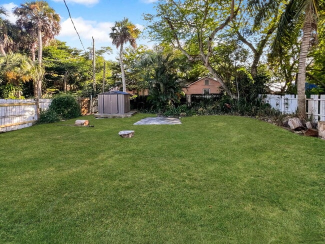 Building Photo - Deck the halls or the French doors, becaus...