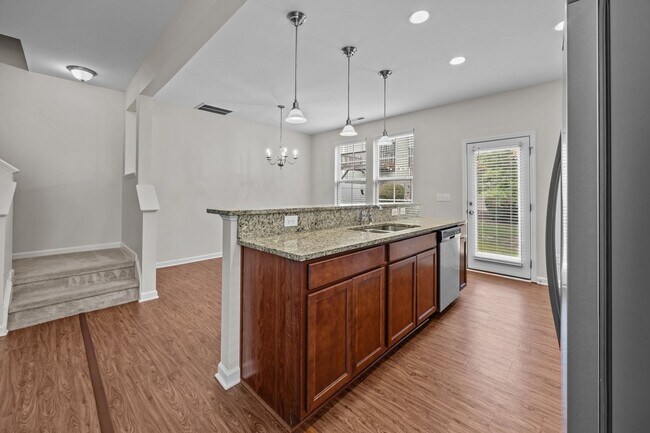 Building Photo - Fantastic 3 Bedroom End-unit Townhome with...