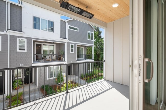 Building Photo - NEW CONSTRUCTION – Stylish 4-Bedroom Townh...