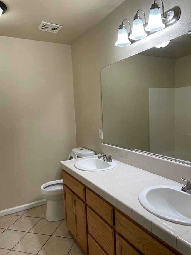 Building Photo - Available Now! Stunning 4 Bedroom, 3 Bathr...