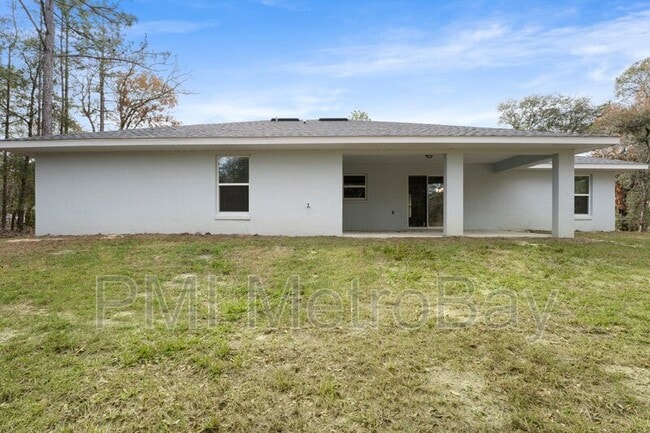 Building Photo - 9461 N Sandree Dr