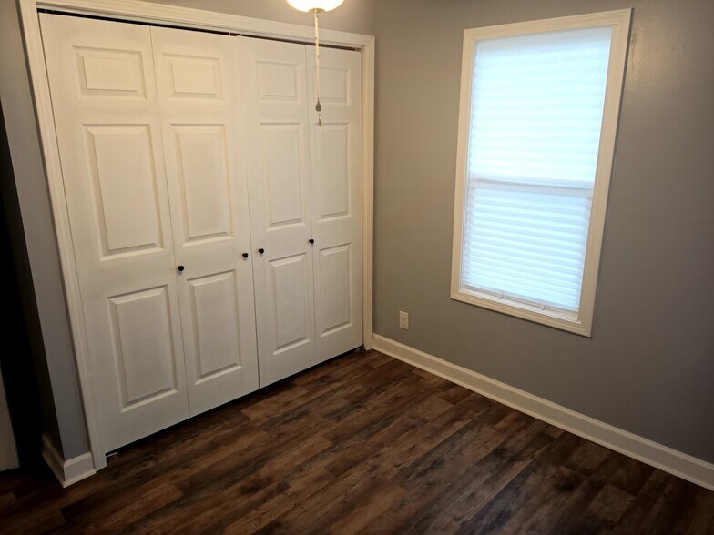 Bedroom 2 with double closet - 303 Fleetwood Dr