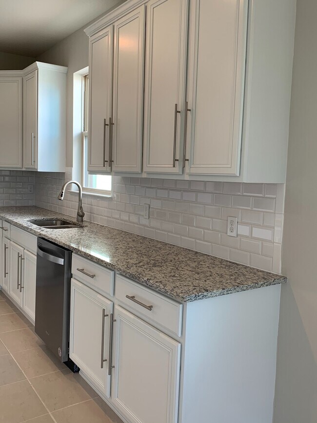 Building Photo - Gorgeous Energy Efficient 4/2 Home in Gated Community Close to Lake Nona