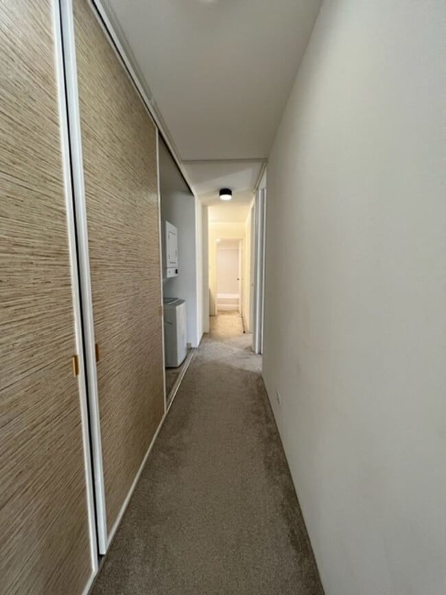 Building Photo - The Pearl- 2 bedrooom one bath unit with 2 assigned parking stalls!