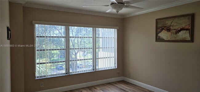 Building Photo - 10777 W Sample Rd