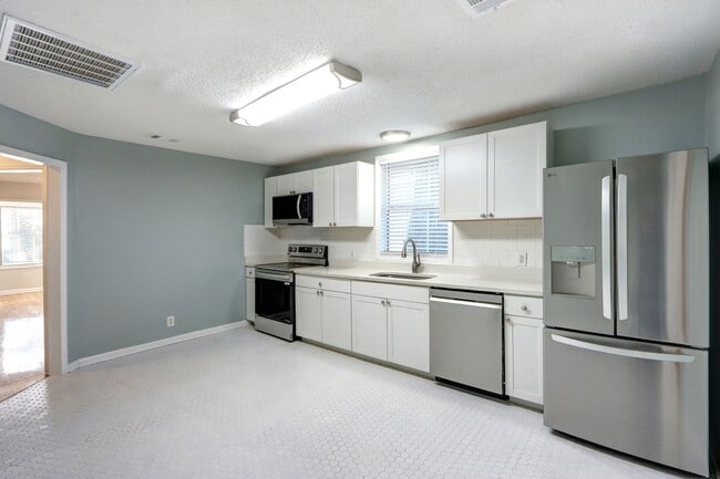 Building Photo - Renovated Single Family - Three Bedroom, Two Bathroom