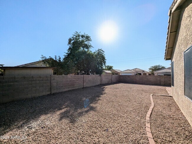 Building Photo - 7059 W Gardenia Ave