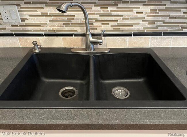 Building Photo - 42160 Woodward Ave