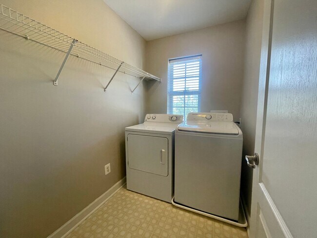 Building Photo - BRAND NEW FLOORING & FRESH PAINT - 3 Bedroom/2.5 Bath Townhome with garage in Wild Wing!