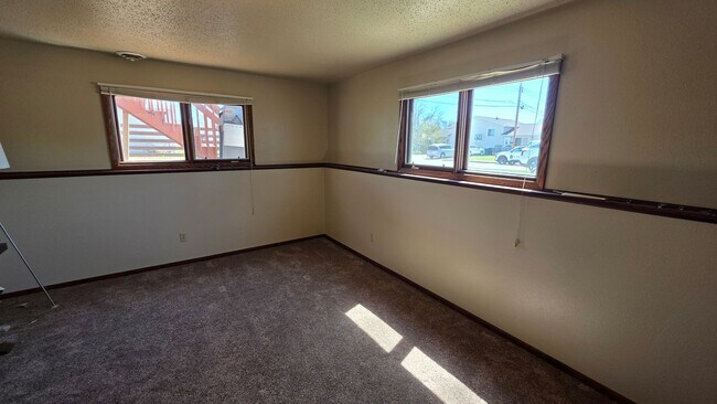 Building Photo - Cute Twinhome is South/Central Bismarck