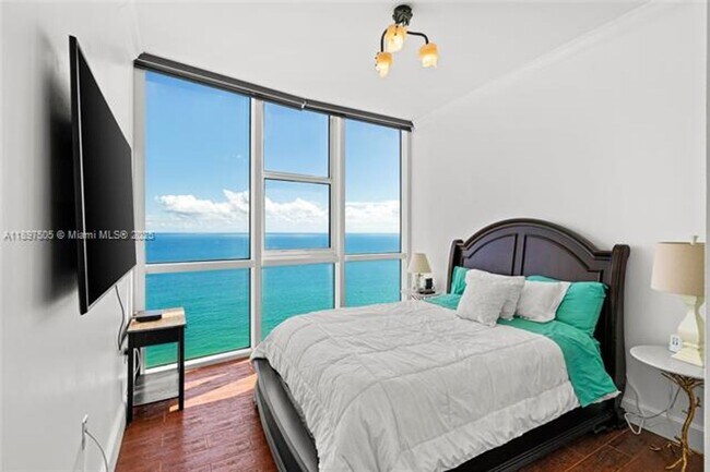 Building Photo - 18201 Collins Ave