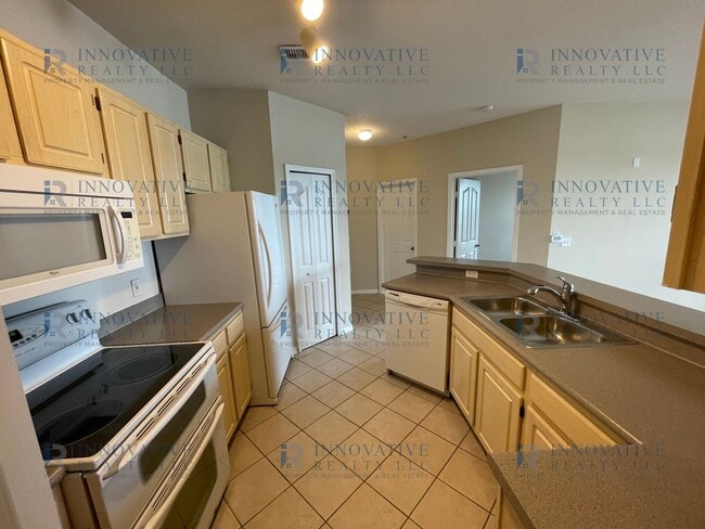 Building Photo - 2BR/2BA First Floor Condo in Visconti in M...