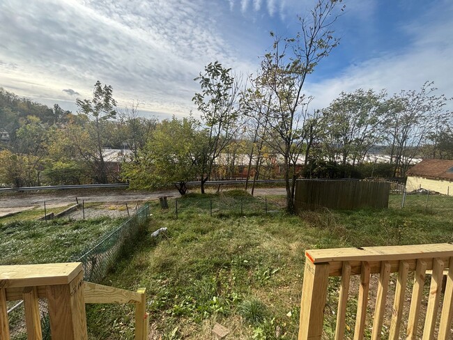 Building Photo - Updated flooring, finished basement, and great outdoor space in a walkable Swissvale location