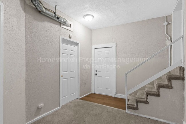 Building Photo - 7135 Woodrow Ave