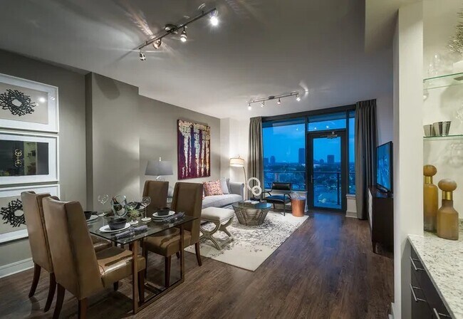 Building Photo - Skyline Views + Luxury Living | Up to 4 We...