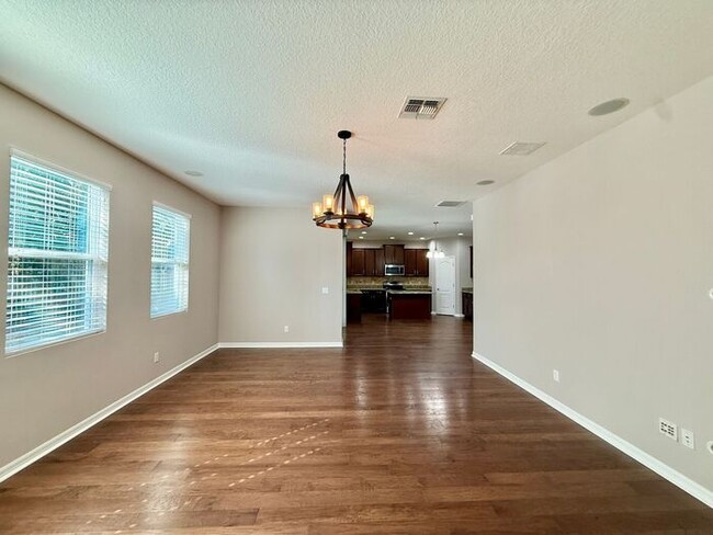 Building Photo - SPACIOUS Two Story Beautiful 5/4 Home in The Enclave At Aloma!