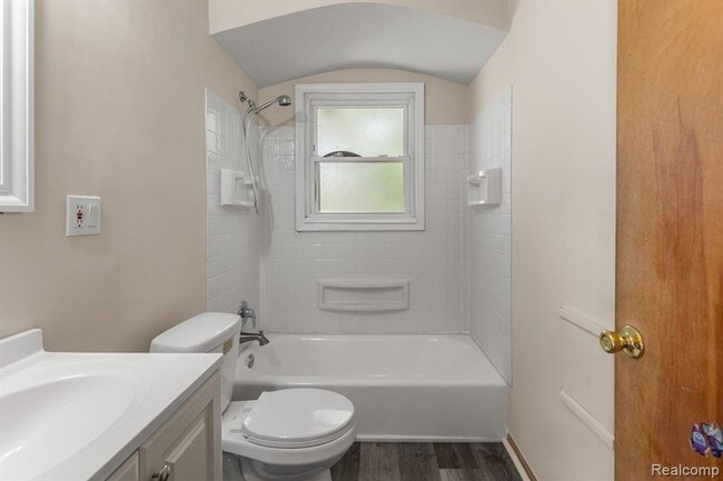 Building Photo - Cozy & Modern: 2-Bed Brick Home with Garage & Finished Basement