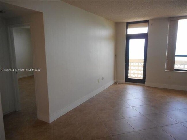 Building Photo - 10185 Collins Ave