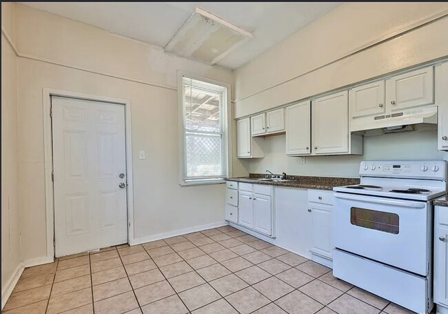 Building Photo - Bright 4-Bed Home with Fenced Yard, Central HVAC, and 3 Finished Levels