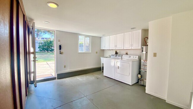 Building Photo - Fantastic Single Family Home w/ Huge Backyard, 1-Car Garage & Plenty of Storage Space!