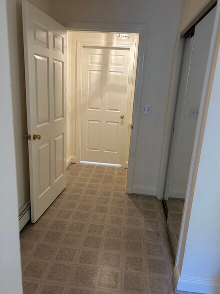Entry foyer with coat closet - 50 Pine St
