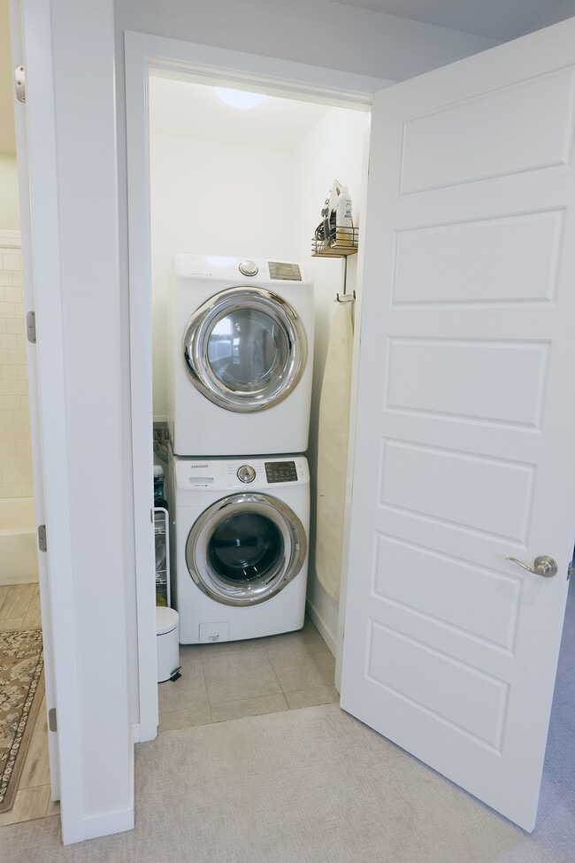 Laundry closet. Washer/dryer included. - 15637 E Broncos Pl