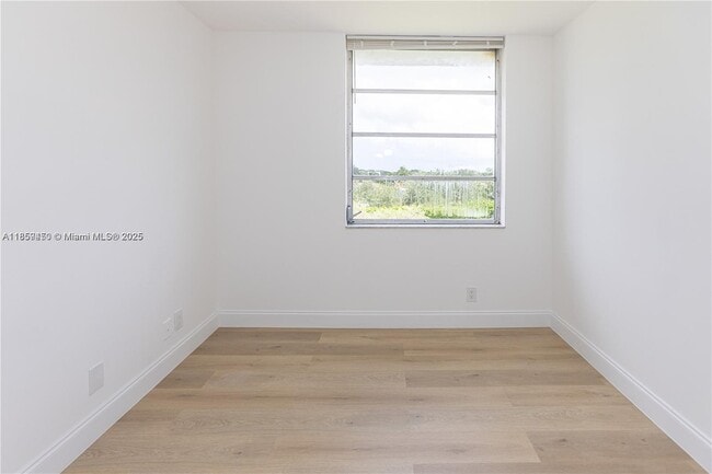 Building Photo - 8740 N Sherman Cir