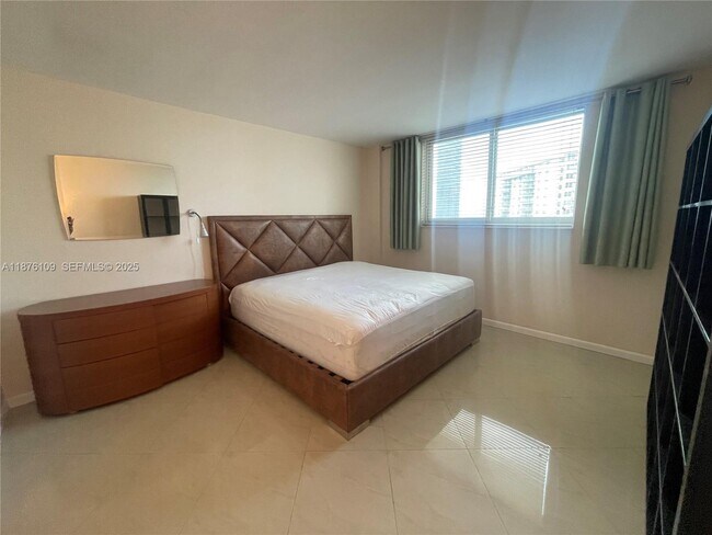 Building Photo - 19380 Collins Ave