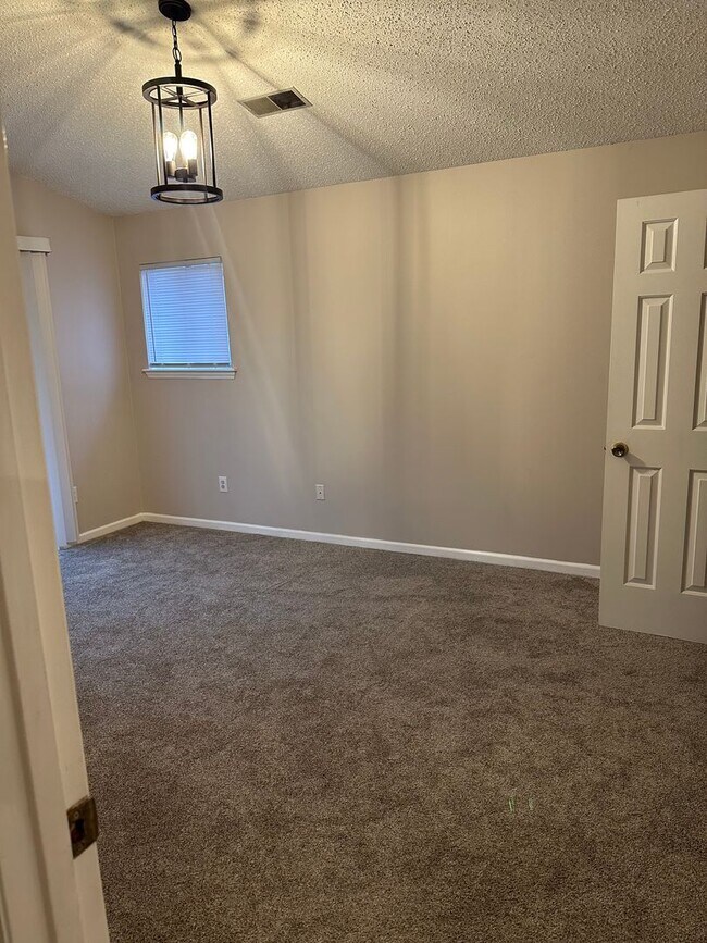 Building Photo - Charming Condo with Private Balcony & Stackable Washer/Dryer Near RTP and Southpoint!