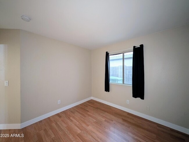 Building Photo - 7059 W Gardenia Ave