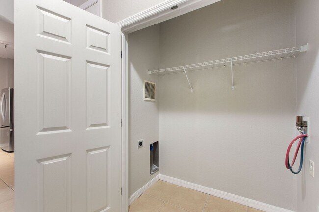 Building Photo - First floor condo in Champions Gate! Ready...