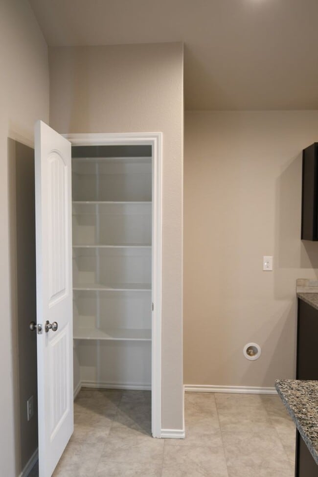 Building Photo - Beautiful Brand New Custom Brick Home 3 bed/ 2 bath/ 2 car garage Open Concept with huge backyard...