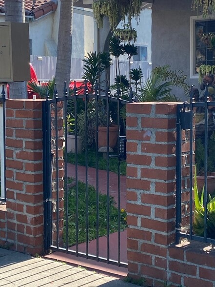Front Gate of Property : Code Entry - 3606 Santa Ana St