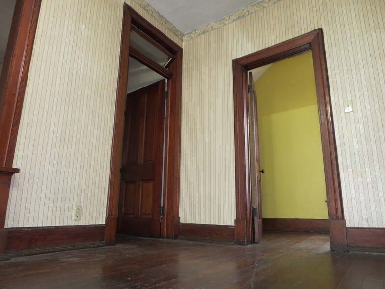 Dining Room looking at hallway and office doors. - 204 S 6th St