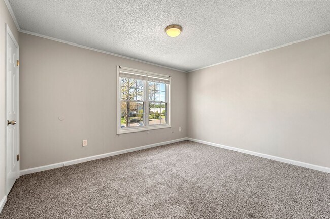 Building Photo - Introducing a Charming End Unit Townhouse ...