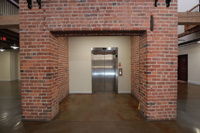 Building Photo - Live in Style at Old Manchester Lofts!