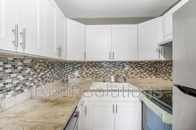 Building Photo - 4715 W Knights Ave