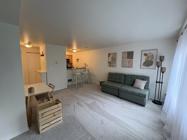 Building Photo - Bright, Modern 1BR Near Hospitals, SU & Transit in secure building with garage parking and a Walk...