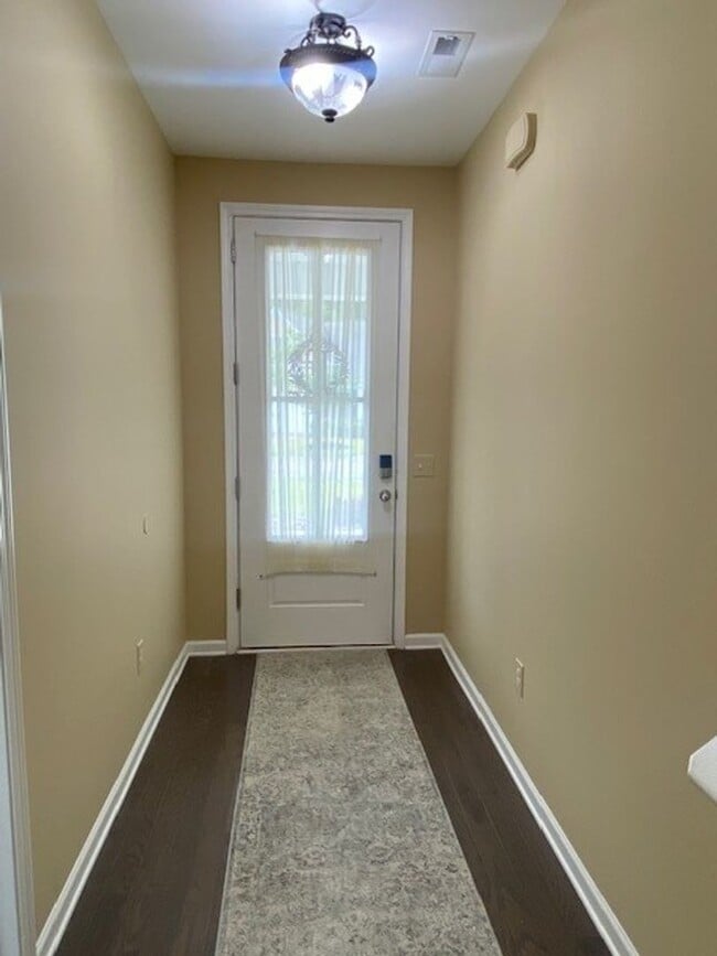 Building Photo - Welcome to this fully furnished 3-bedroom, 3-bathroom townhouse located in the vibrant Hawkeswate...