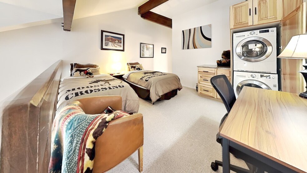 two twin beds (can be pushed together to make king) in loft - 1530 Empire Ave