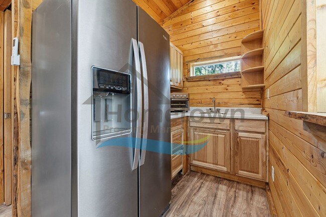 Building Photo - 1 Bedroom 1 Bath Cottage Style Studio Home with Off Street Parking Available in Sagle, Idaho!