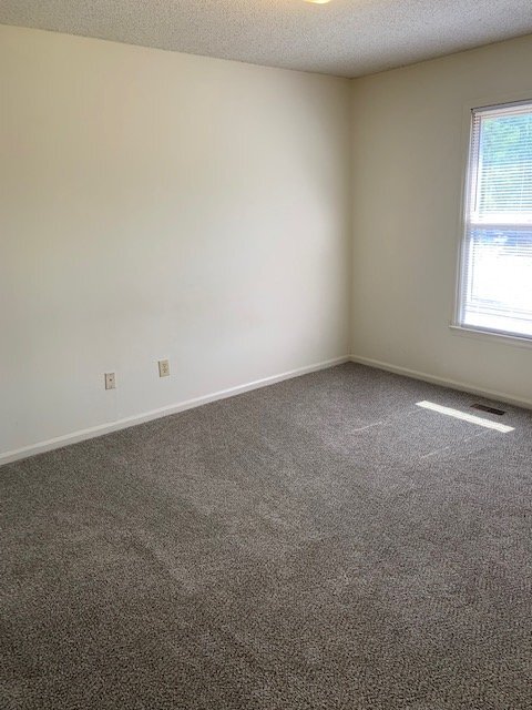 Building Photo - "Charming 2-Bedroom Retreat with 2.5 Baths on B's BBQ Road – Spacious 955 Sq Ft Living in Greenvi...