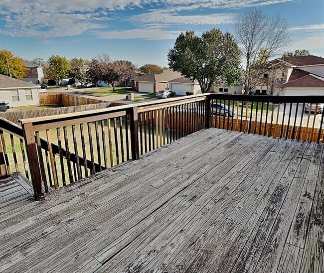 Building Photo - Corner Lot Charmer with Two-Story Deck and Bonus Game Room!